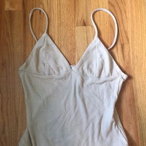 Tan body suit, barely worn